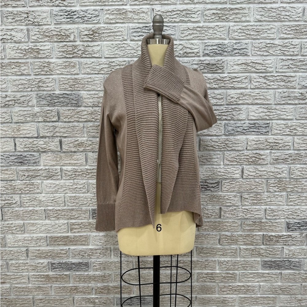 Cardigan with subtle specs of gold.